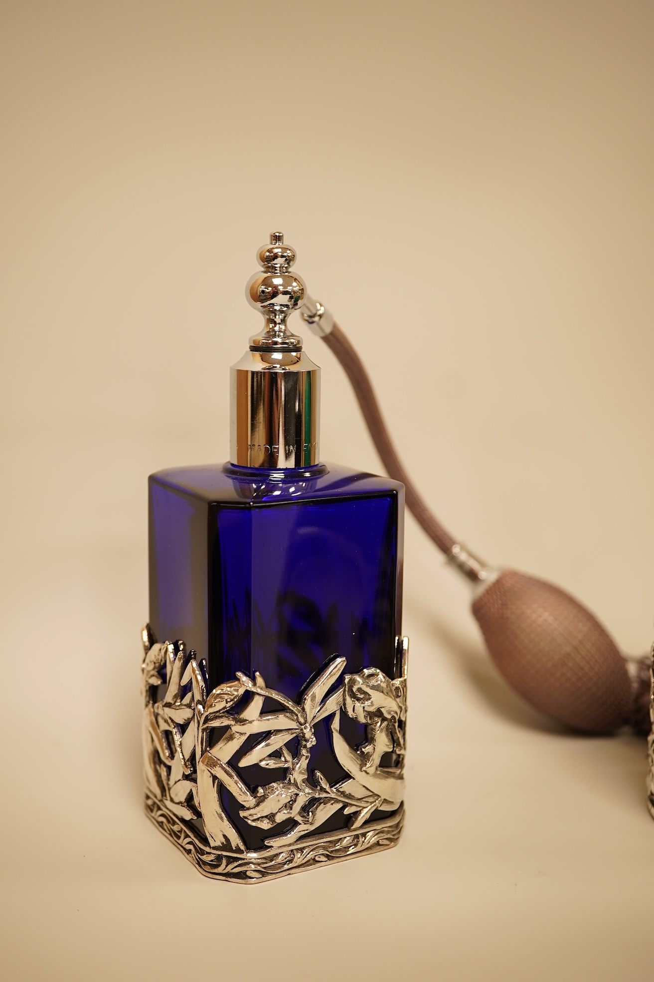 A collection of decorative glass and metal perfume bottles, miniature frames and pill boxes, green glass perfume bottle 15.5cm high.